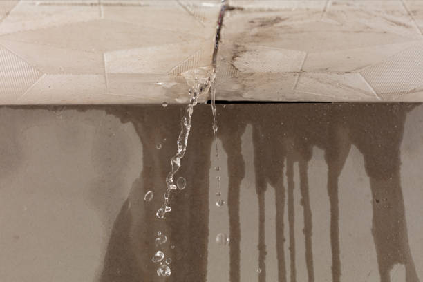 Professional Flood Damage Cleanup technician working in Alliance, OH